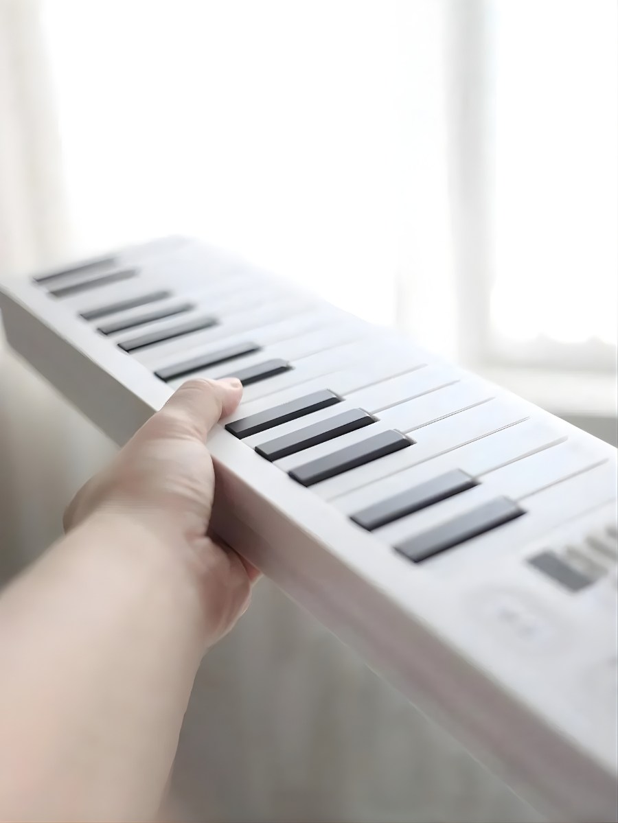 1 clavier électronique portable pliable à 61 touches (avec sac de transport)